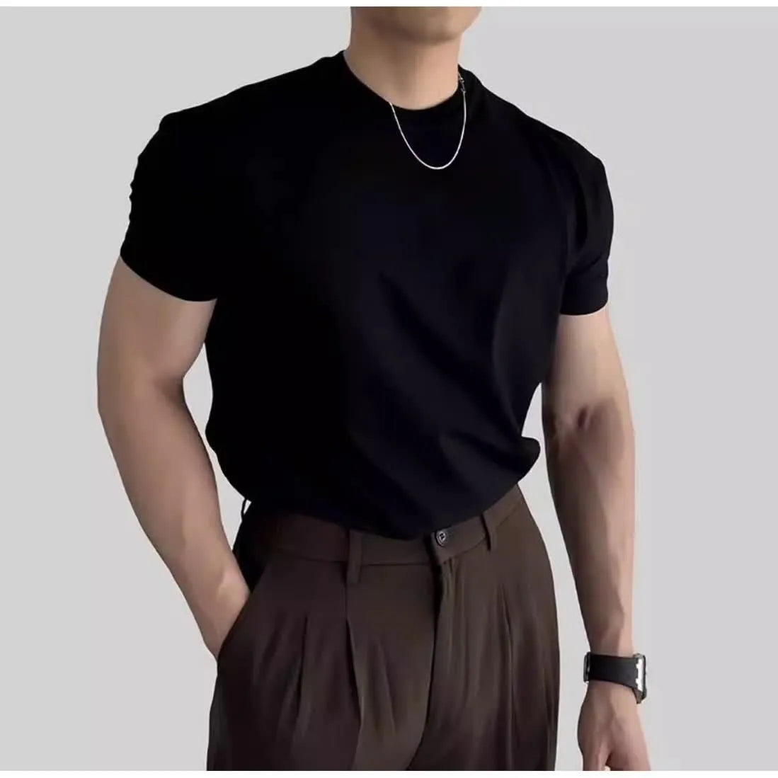 Men's solid colour slim fit polyester short sleeve sports t-shirt in black, front view