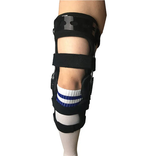 Black anterior ligament knee pad with iron stabilisers showing multi-layer construction