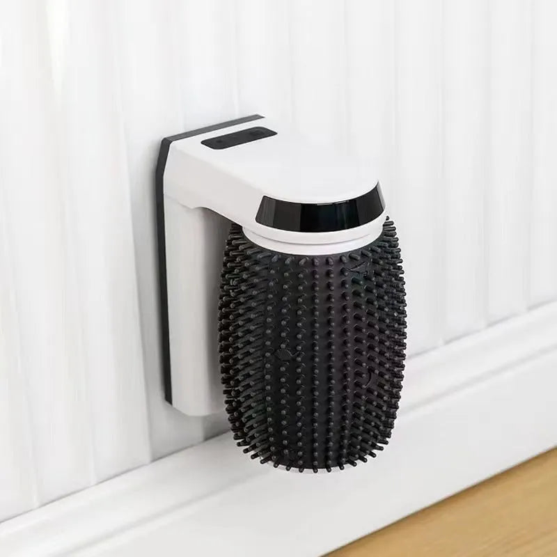 White automatic cat self grooming brush mounted in corner with silicone bristles