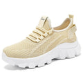 Women's white Flyknit running sneakers with thick PVC sole and lace-up front.