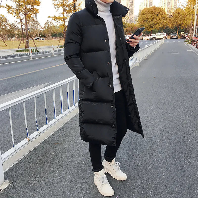 Long cotton-padded jacket in black with stand-up collar, over-knee length, casual winter coat for women