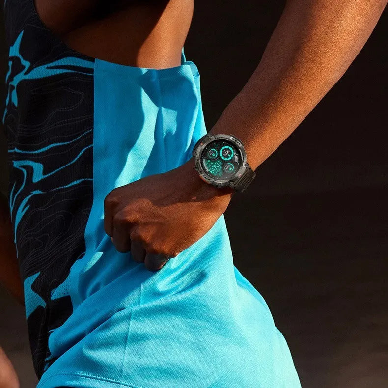 Outdoor smartwatch with round TFT screen, zinc alloy case, and classic buckle strap on a wrist