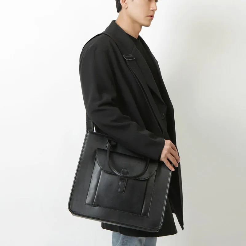 Shoulder messenger bag in black PU leather with vertical square shape and shoulder strap