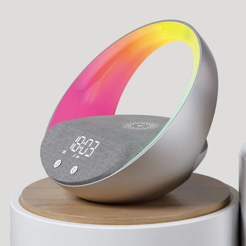 Beige multifunctional wireless charging clock with Bluetooth speaker and warm white LED wake-up light on a wooden table.