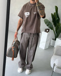 Men's casual striped lace-up polyester trousers in regular fit, front view.
