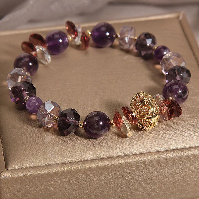 Purple crystal women's bracelet with pumpkin, wind chime, and lucky bead design featuring rhinestone details