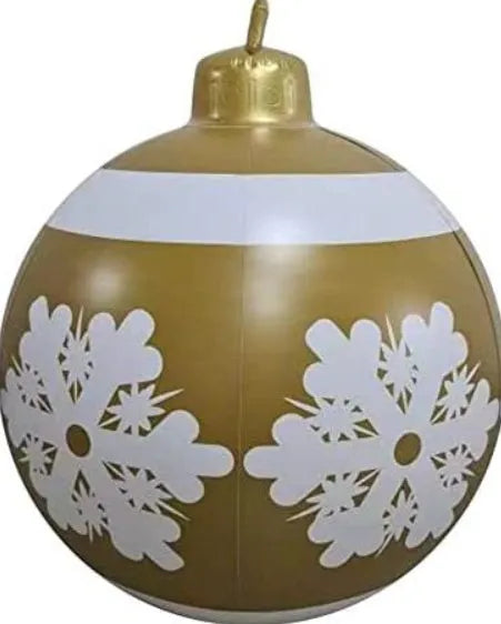 Large red and white striped inflatable Christmas ball ornament hanging on an outdoor tree
