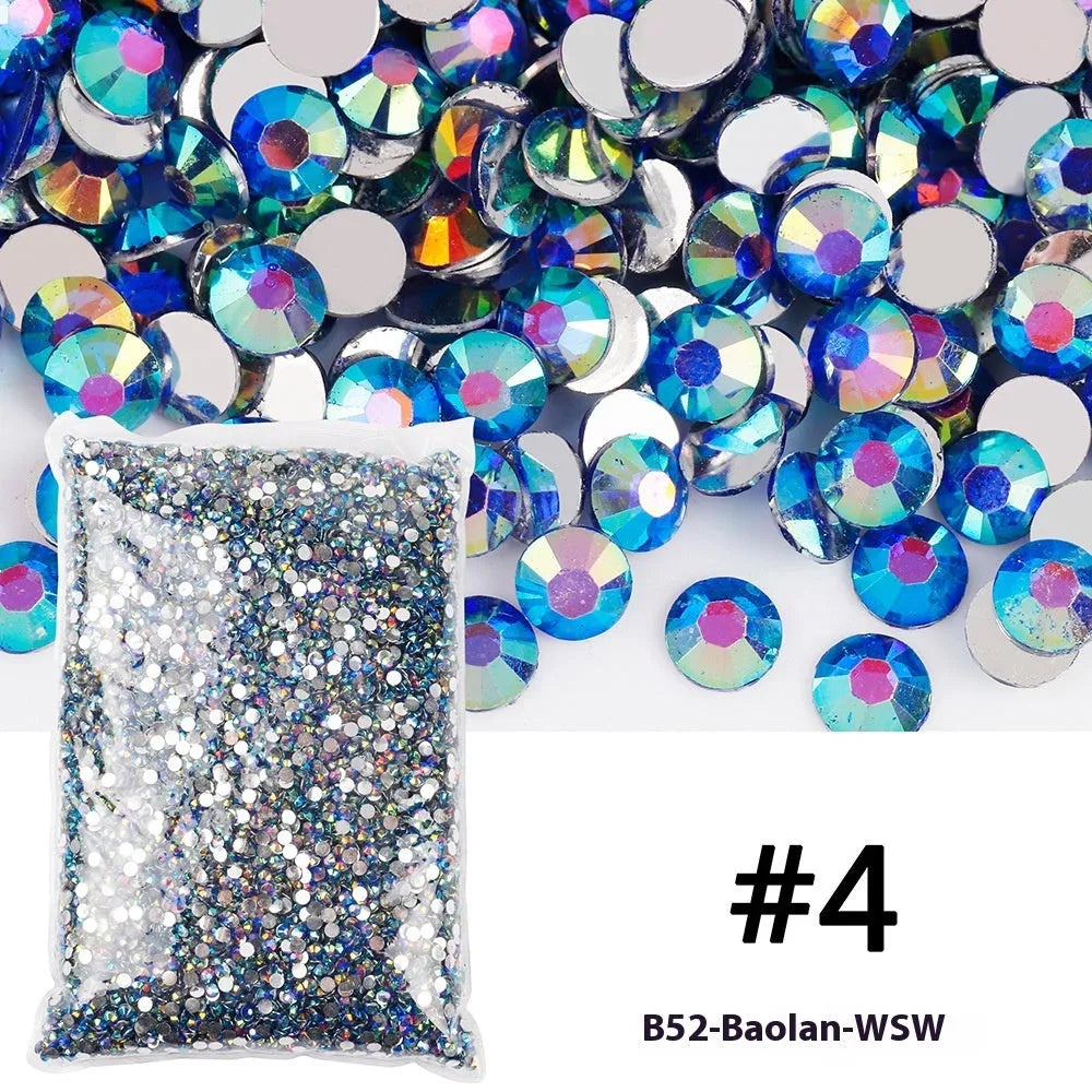 Plastic resin nail art rhinestones in multiple colours with electroplated surfaces arranged in mesh packaging