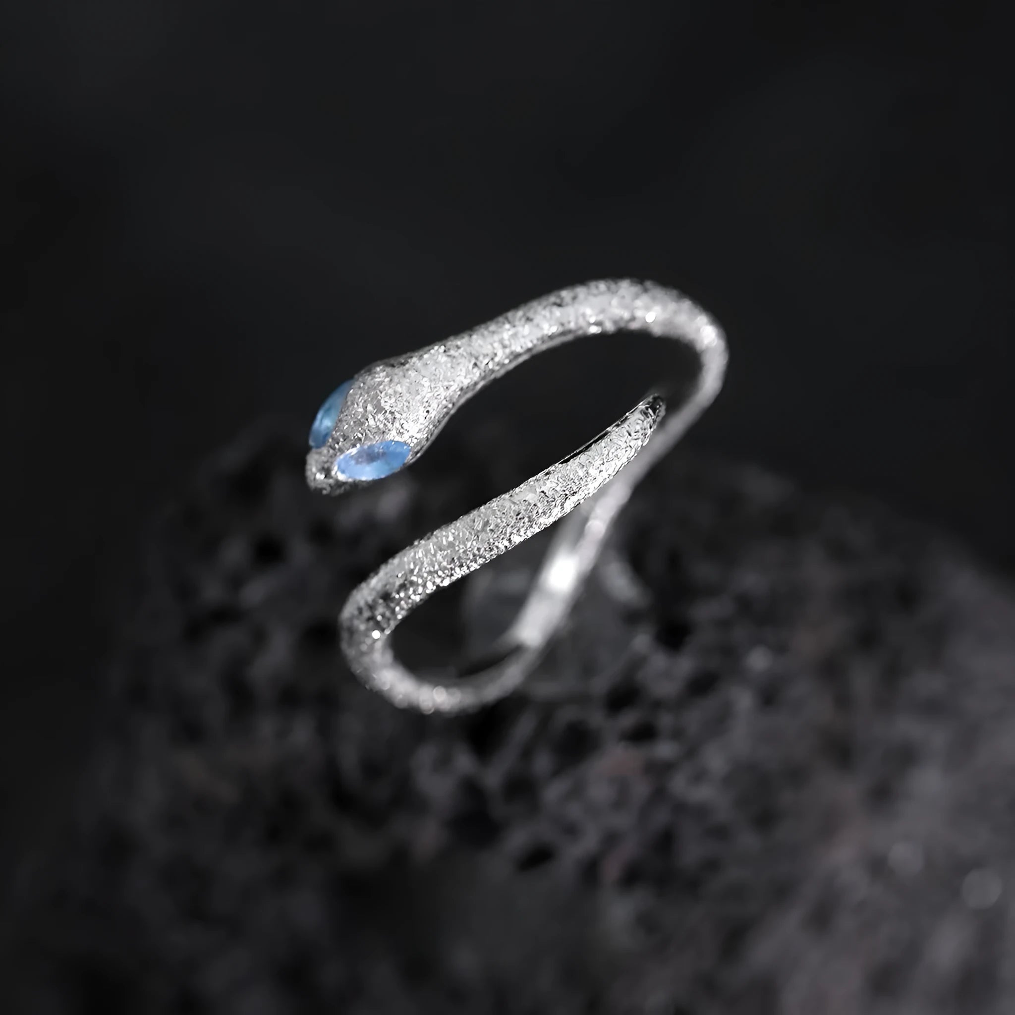 Adjustable silver-plated ring with snake design and zodiac motifs in platinum colour
