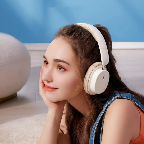 Beige or grey Bluetooth head-mounted earphones with Type-C charging port