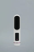 Portable charging negative ion straight hair comb in blue, grey, or white colour.