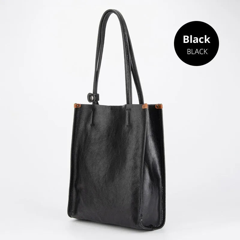 Large capacity genuine leather city commuter shoulder tote bag in black, soft square vertical shape with slit pocket