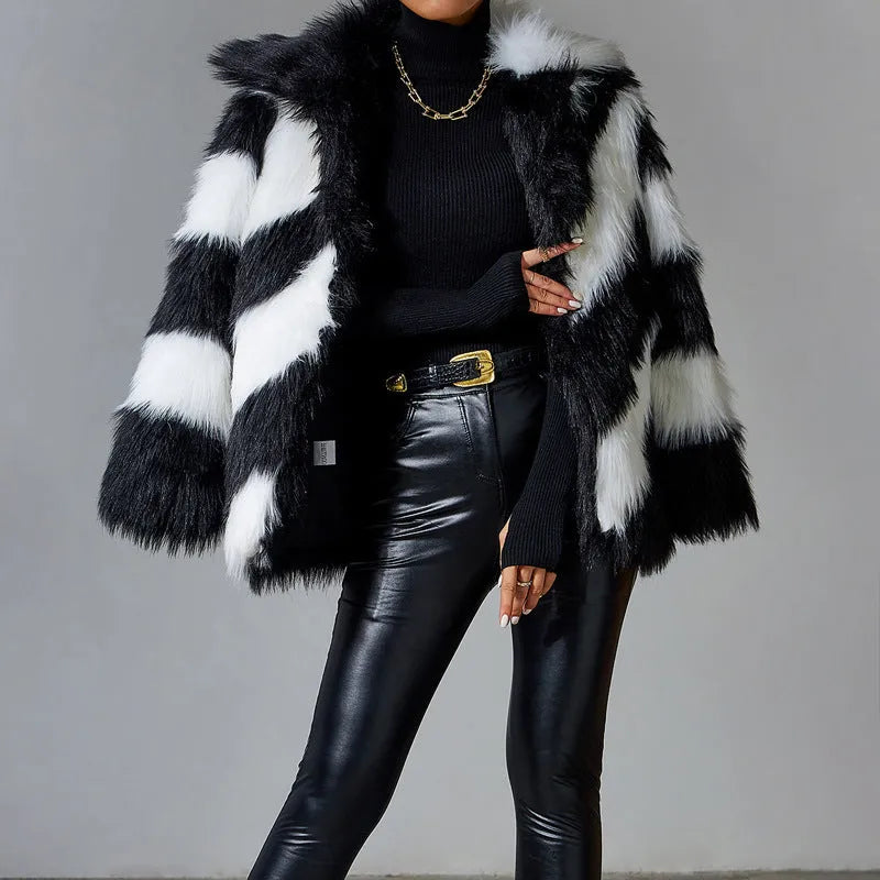 Women's faux fur coat with contrast colour lapels and a removable fur collar.