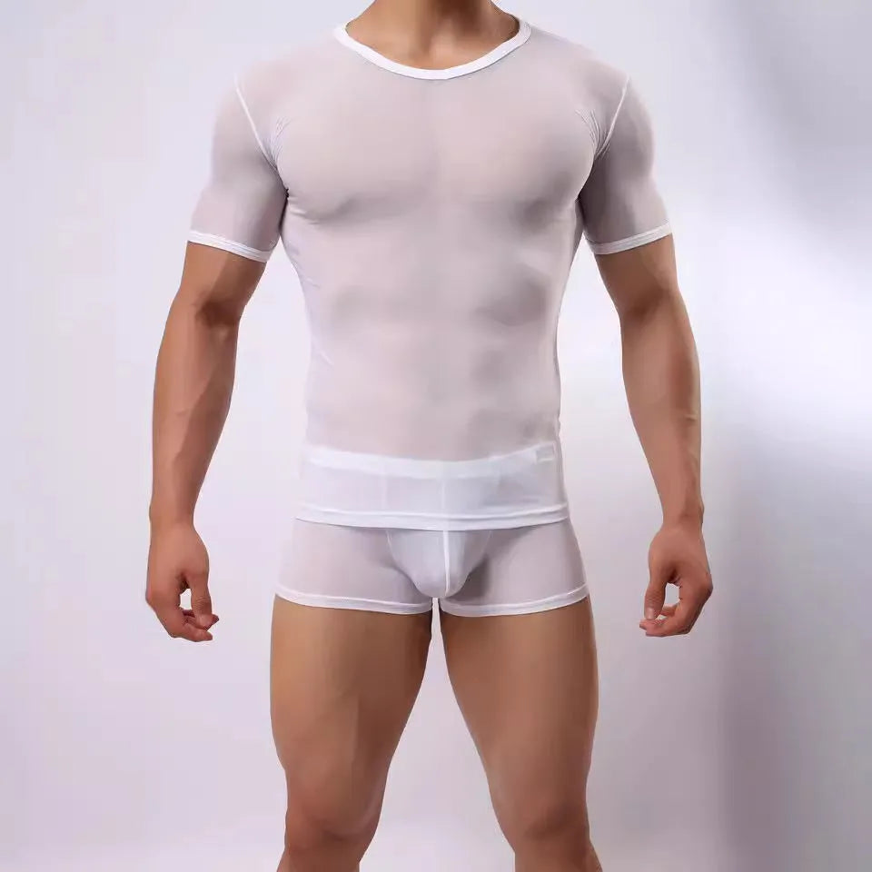 Man wearing a slim fit, transparent mesh short-sleeved T-shirt in a solid colour.