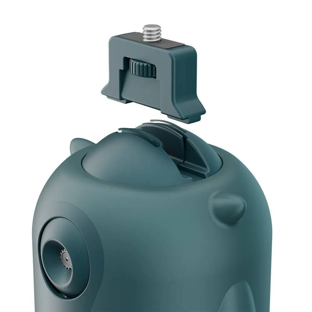 Dark green intelligent gimbal with AI face tracking and 360-degree rotation on a tripod.