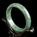 Dark pea green jade beaded bracelet for women on a gift box with certificate.