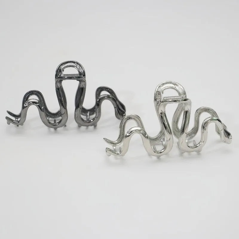 Silver Slytherin serpentine snake design metal hair barrette measuring 10.5cm.