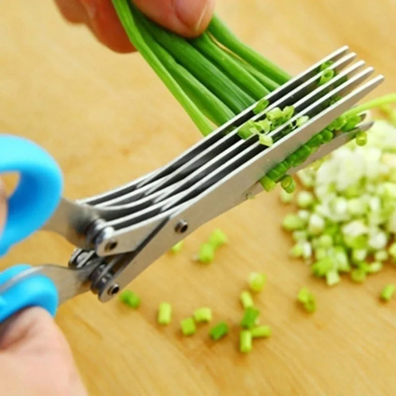 Green stainless steel multi-blade herb scissors with V-shaped design for cutting nori and green onions.