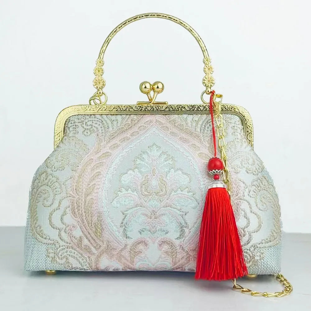 Chinese embroidery cheongsam handbag in polyester with shell shape and internal zipper compartment