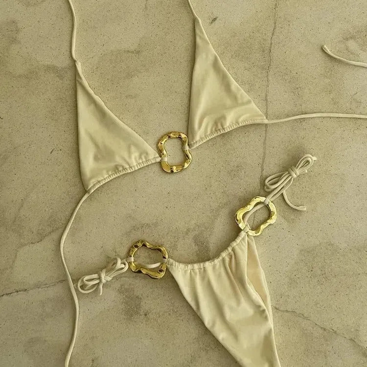 Women's halter neck bikini top and low-waist lace-up print briefs in solid colour