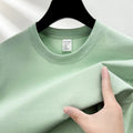 Men's thin cotton drop shoulder t-shirt in solid colour on hanger