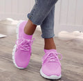 Women's lace-up platform sneakers in various colours with flat rubber soles