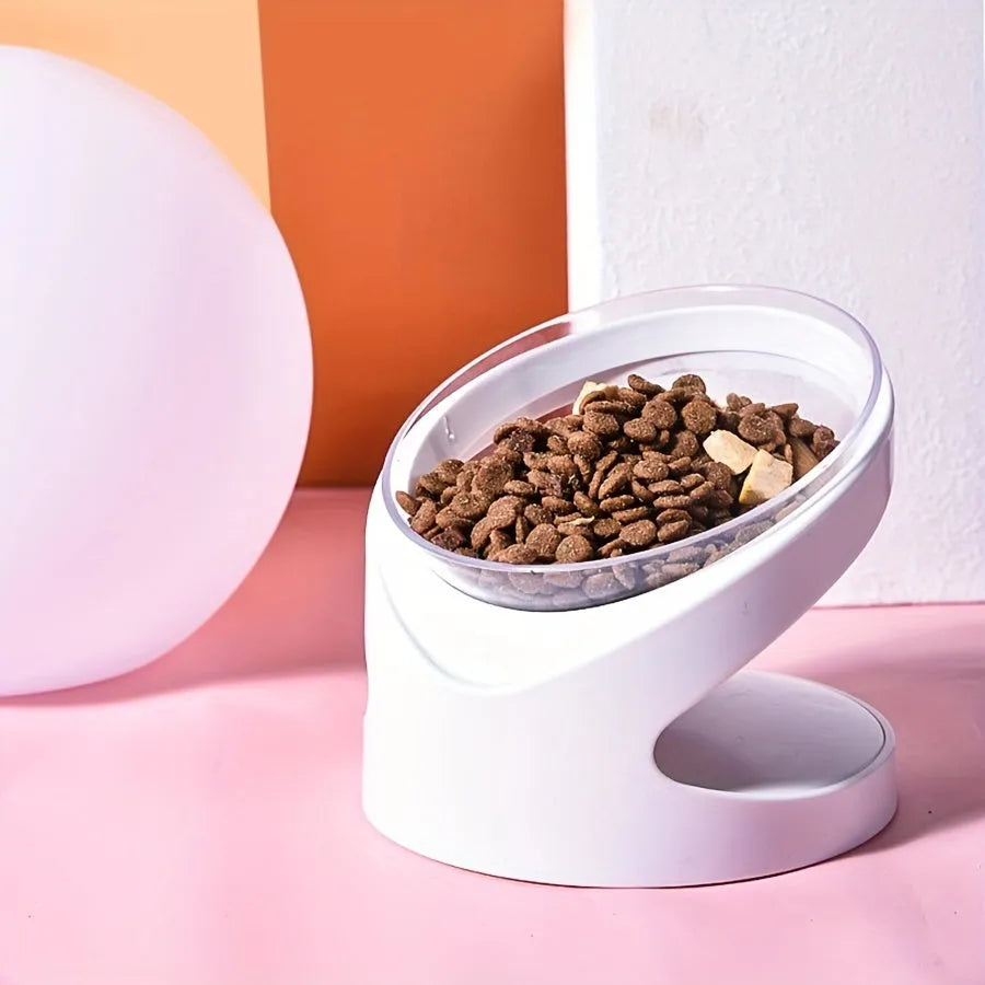 White elevated cat food bowl with clear plastic construction and anti-vomit tilt design