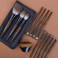 12 piece makeup brush set with wooden handles in a portable PU carry bag