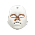 Rechargeable manual touch LED beauty mask in black, white, or rose gold accents on a white background