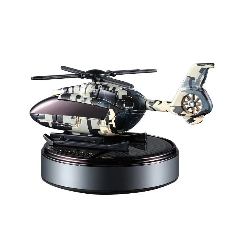 Camouflage patterned solar car perfume decoration for vehicle dashboard odour removal.