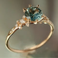 Gold geometric claw zircon ring with chamfered square pattern design