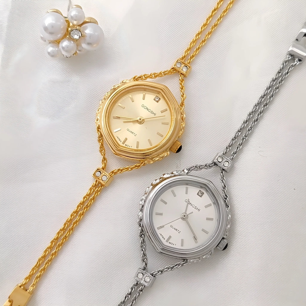 Gold and silver mori style ladies quartz watch with 25mm dial and chain strap
