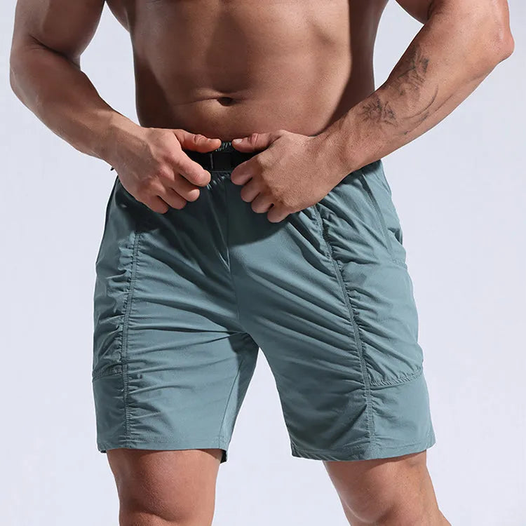 Men's athletic shorts with pockets and elastic waistband in grey, available in sizes M to XXXL