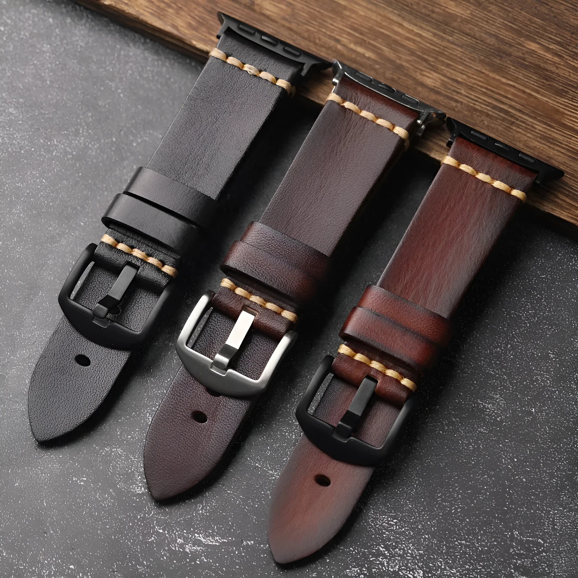 Handmade leather watch strap with stainless steel buckle in black, brown, and red colours