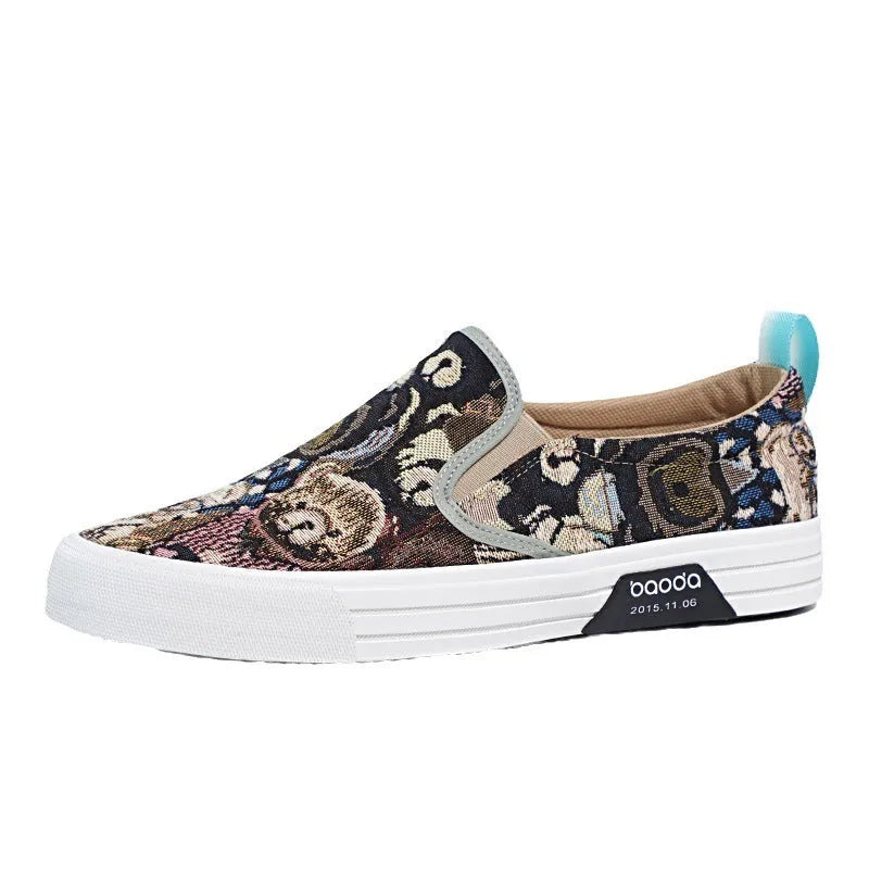 Khaki coloured canvas low-top slip-on sneakers with vulcanised rubber soles and a round toe.