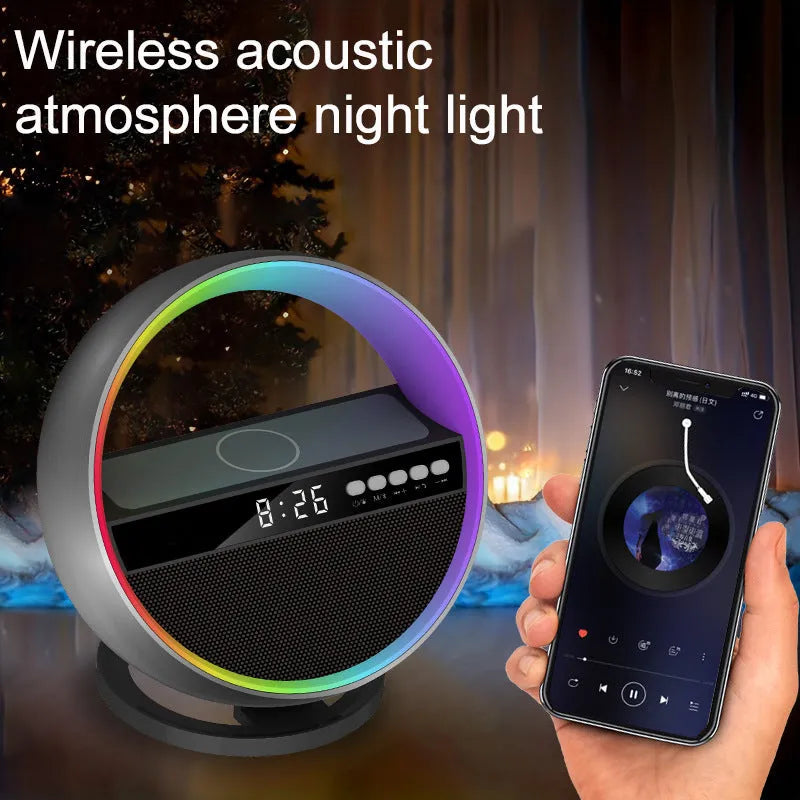 White multifunction RGB night light wireless charger and Bluetooth speaker on a desk with a smartphone on the charging pad