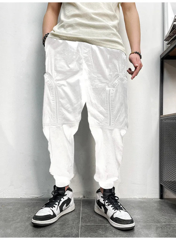 Men's loose fit cotton cargo trousers with elastic waist and zipper pockets in army green
