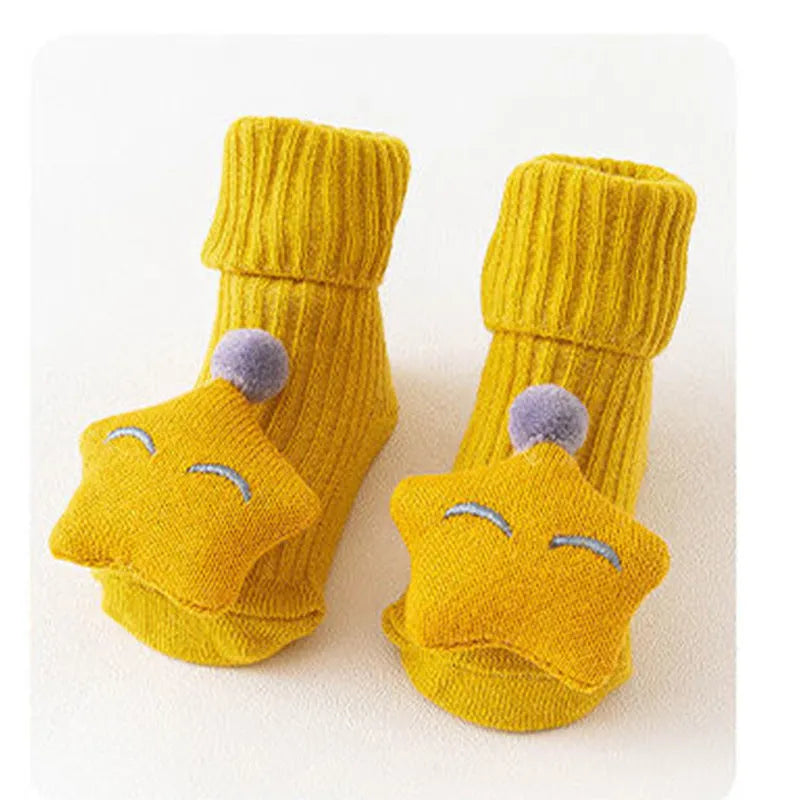 Cotton baby floor socks in multiple designs including panda, bow, and star patterns.