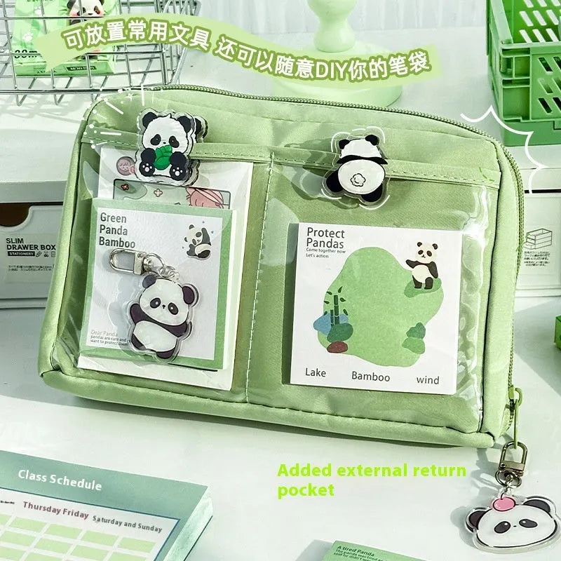 Green canvas pencil case with 12-layer panda design and multiple compartments for stationery organisation