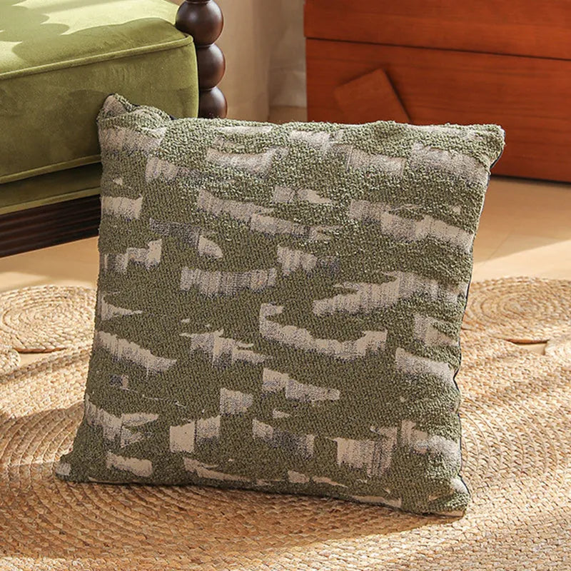 Close-up of a beige and green floral Jacquard woven cushion cover with textured pattern, 45cm square.