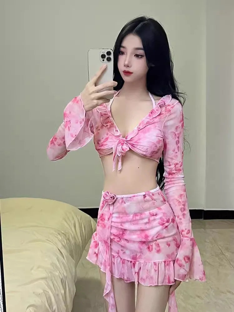 Women's floral pattern bikini swimsuit in cherry blossom pink colour.