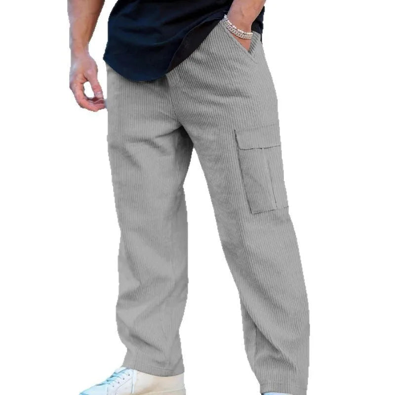 Men's loose-fitting corduroy cargo trousers in a straight-leg cut, shown in a solid colour.