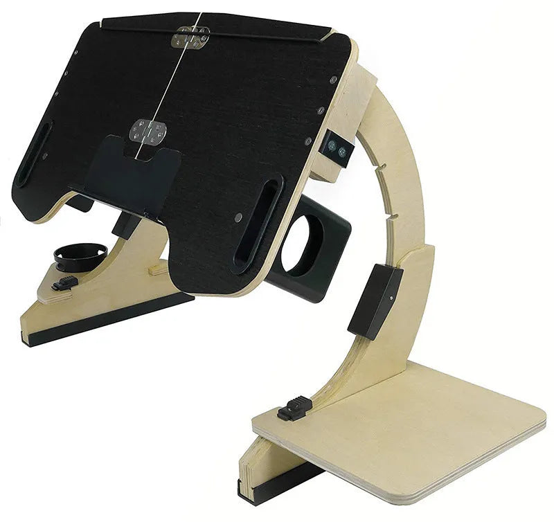 White maple wooden folding computer desk with adjustable angle, shown on a bed.