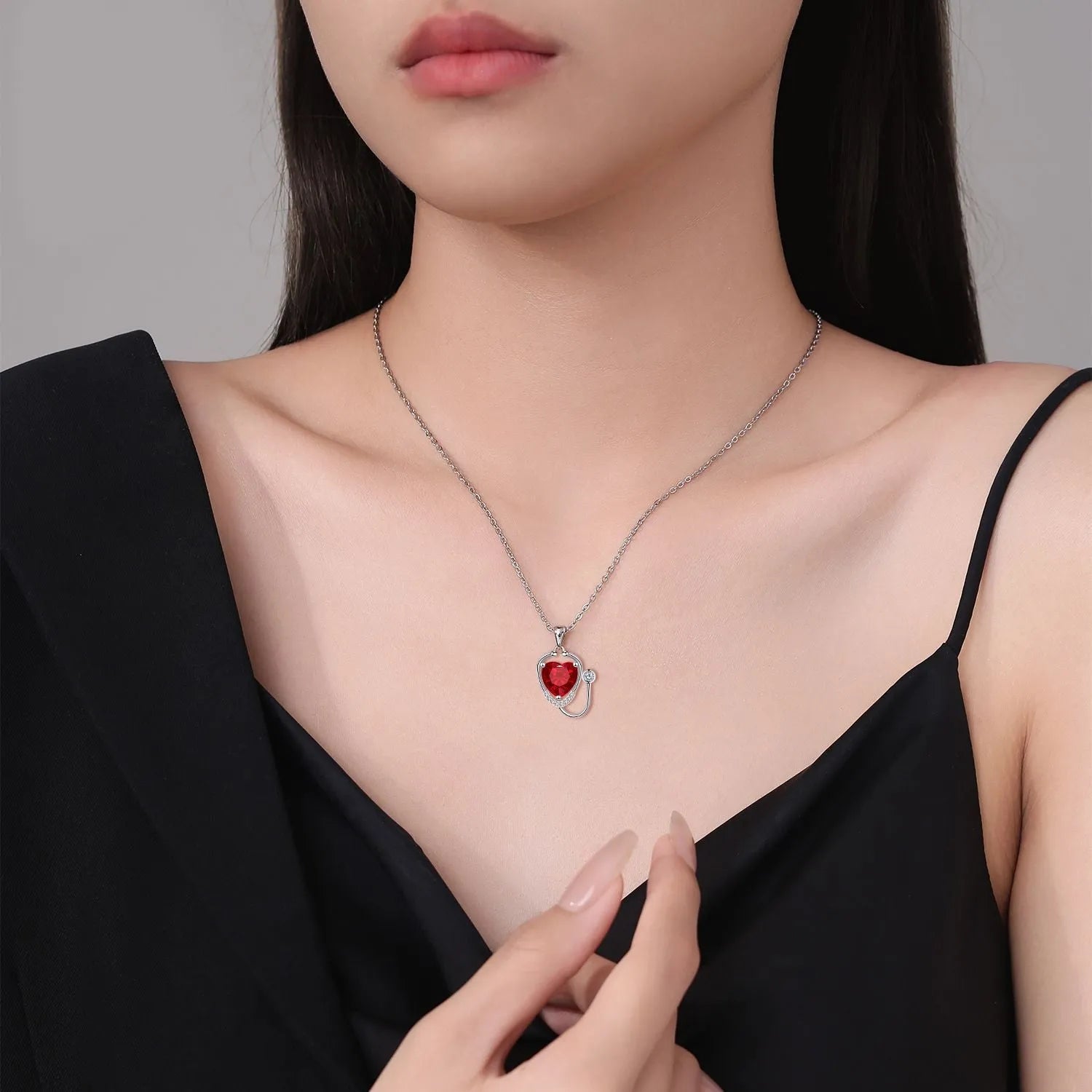 Women's stethoscope wing pendant necklace in red diamond colour with copper construction