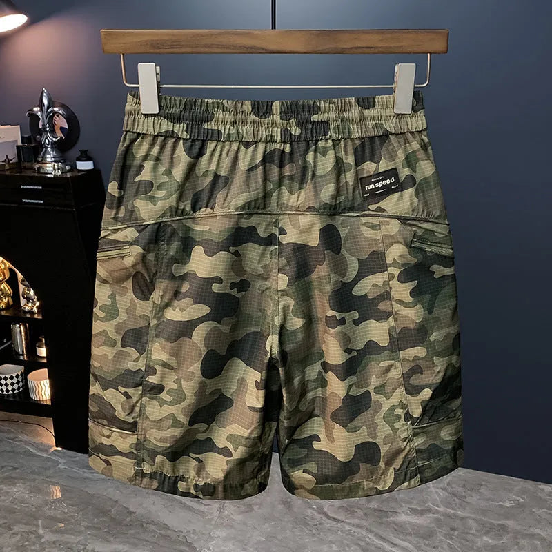 Man wearing loose-fit camouflage cargo shorts made from quick-dry cotton blend fabric