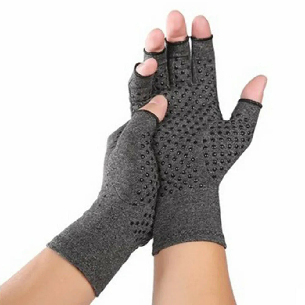 Gray half finger joint compression gloves on a plain background showing anti-slip knit texture