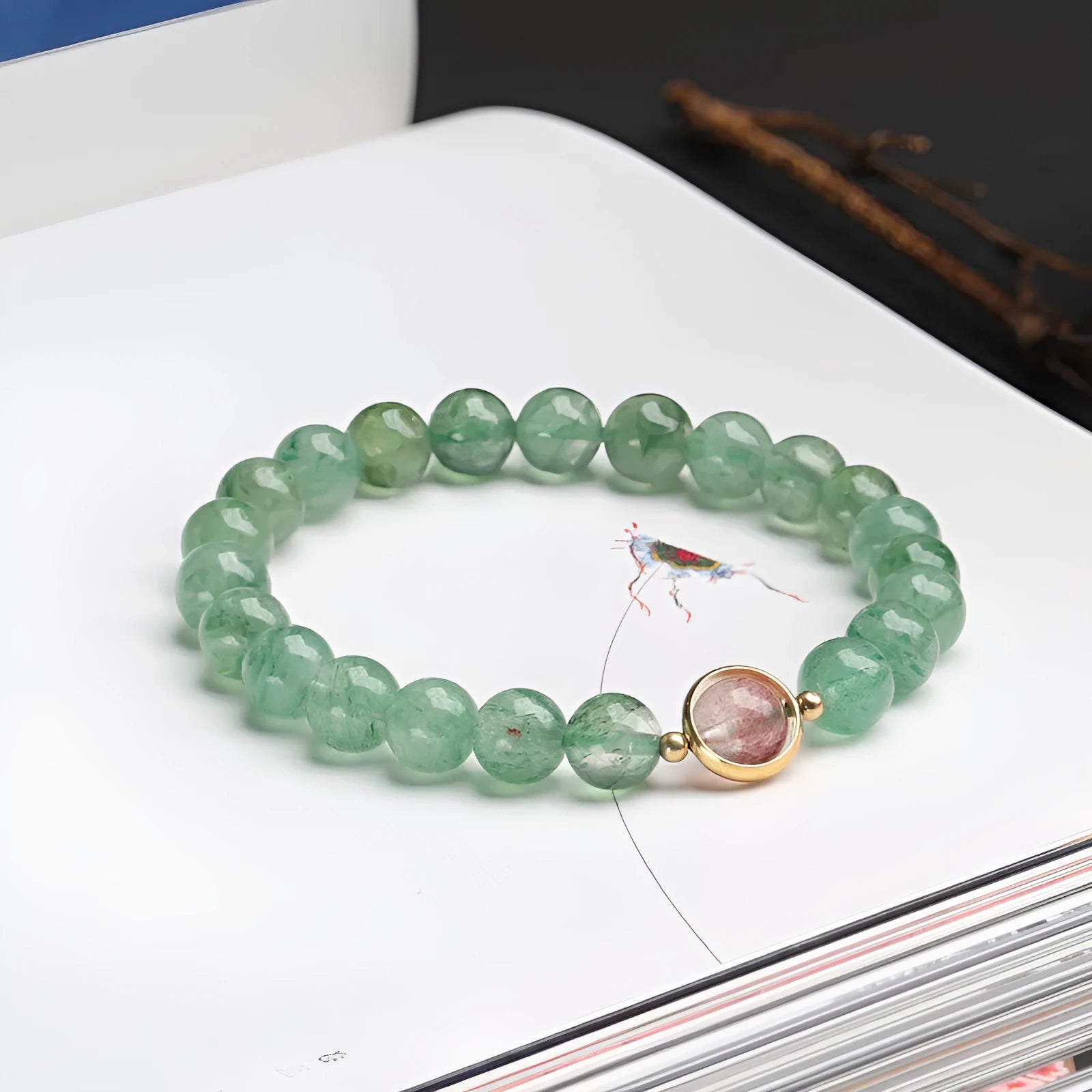 Women's green strawberry quartz 7.5mm bead bracelet with hand-woven Chinese style auspicious patterns