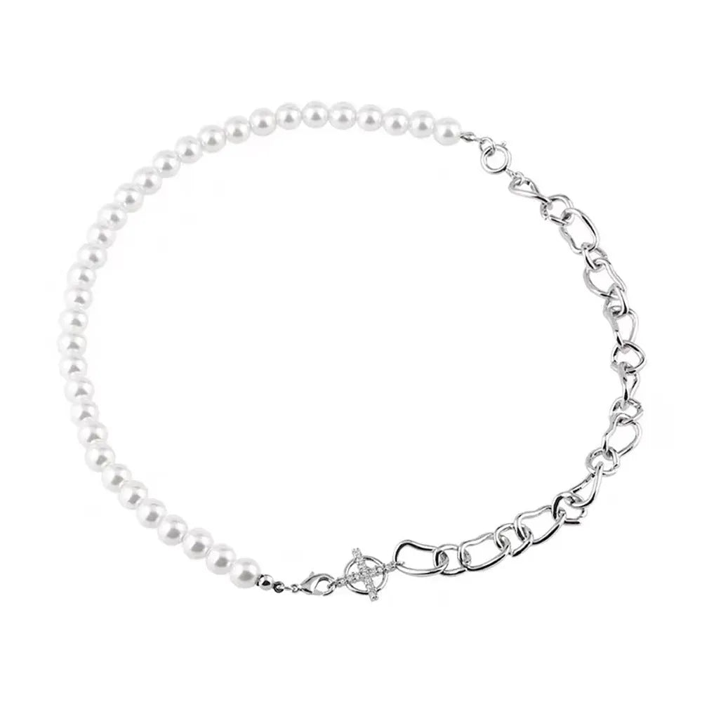 White acrylic geometric asymmetric pendant on a twisted chain, a clavicle-length necklace.