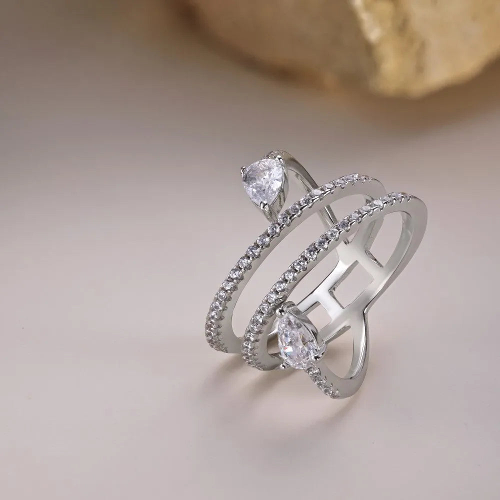 Sterling silver S925 drop-shaped ring in white gold colour on display