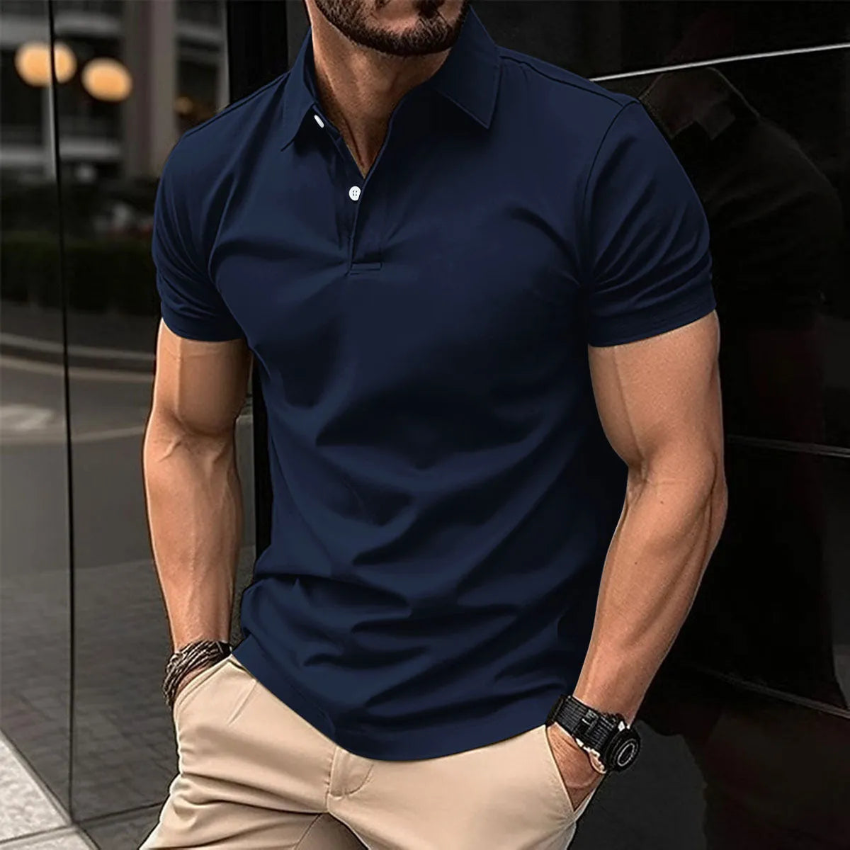 Men's short sleeve polo shirt with button lapel collar in a solid colour.